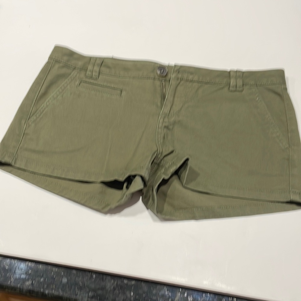 Express green, olive , shorts that are barley worn. Has side pockets.